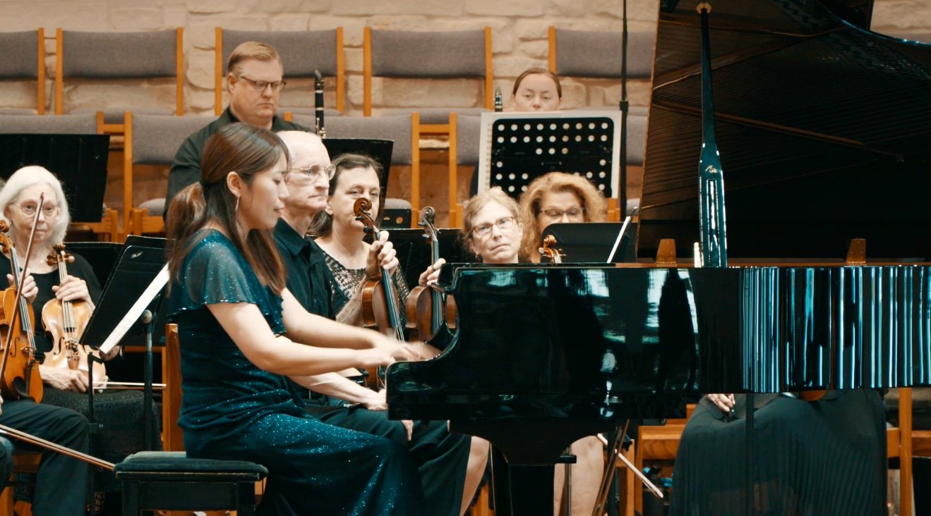 Dr. SungEun Park performing as concerto soloist with orchestra